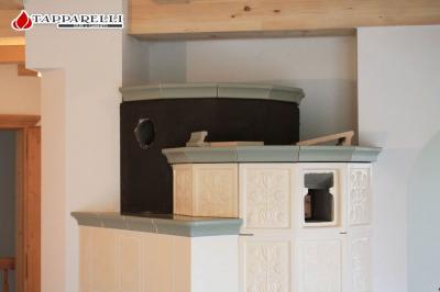 Fase 5. - Il secondo giorno viene conclusa l'installazione e si procede con l'intonacatura della parte in muratura. Viene effettuata la fugatura delle mattonelle, la pulizia ed infine il collaudo. Fase 5.